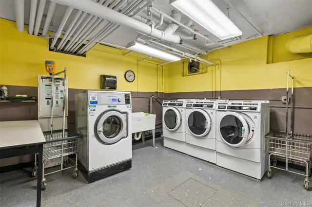 a utility room with dryer and washer