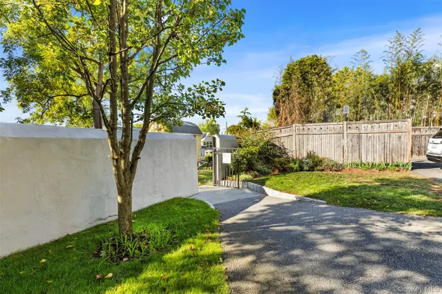 a view of backyard with green space