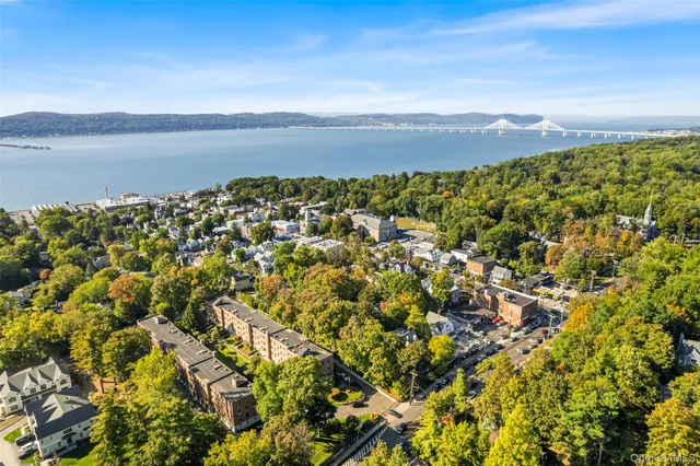a view of a city with a lake