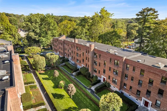 a view of a balcony with chairs