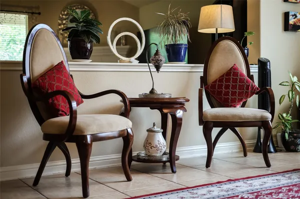 an aerial view of a residential houses with outdoor space