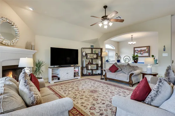 a front view of house with a garden