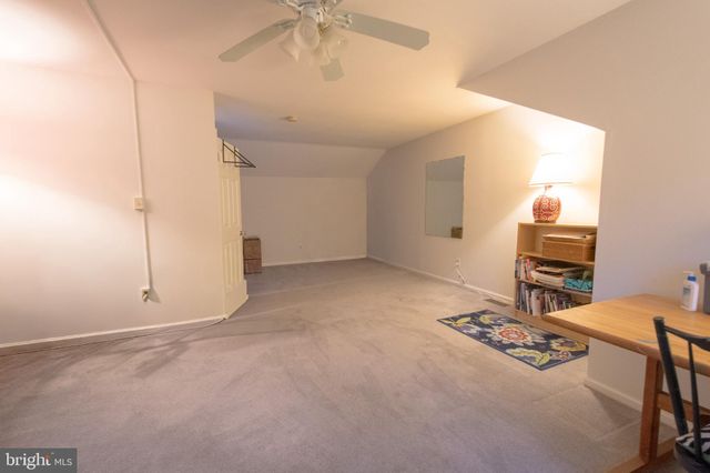 a workspace with furniture and window