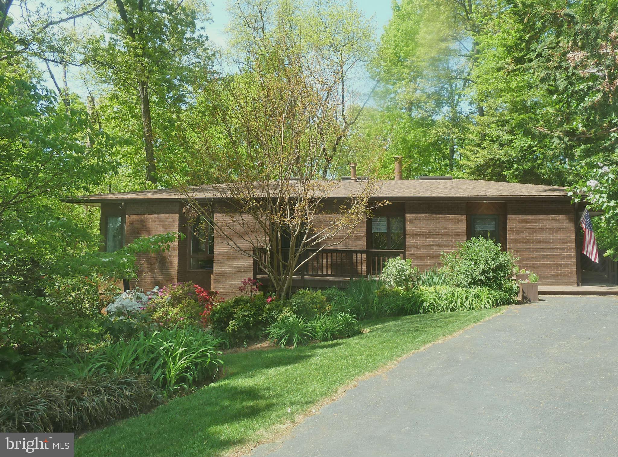 11431 Hook Road Reston, VA 20190 - Photo 1 of 30 front view of a house with a garden