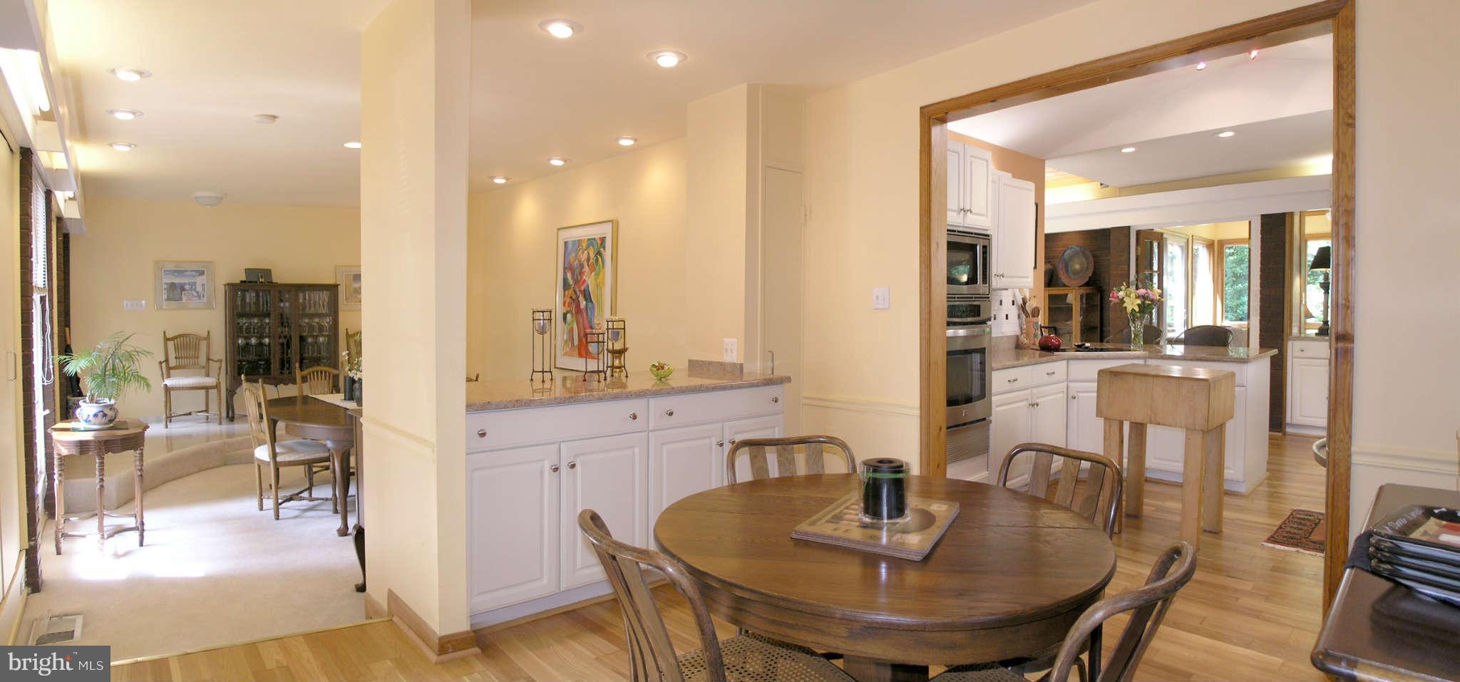 11431 Hook Road Reston, VA 20190 - Photo 12 of 30 a dining room with furniture and wooden floor