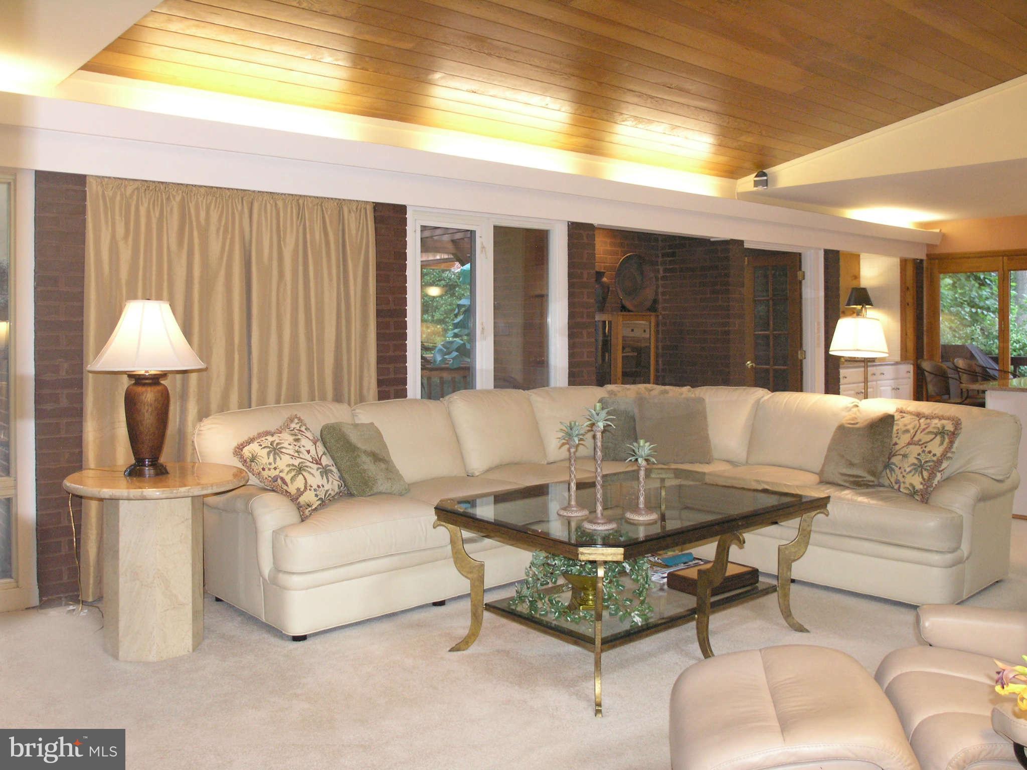 11431 Hook Road Reston, VA 20190 - Photo 15 of 30 a living room with furniture and a table