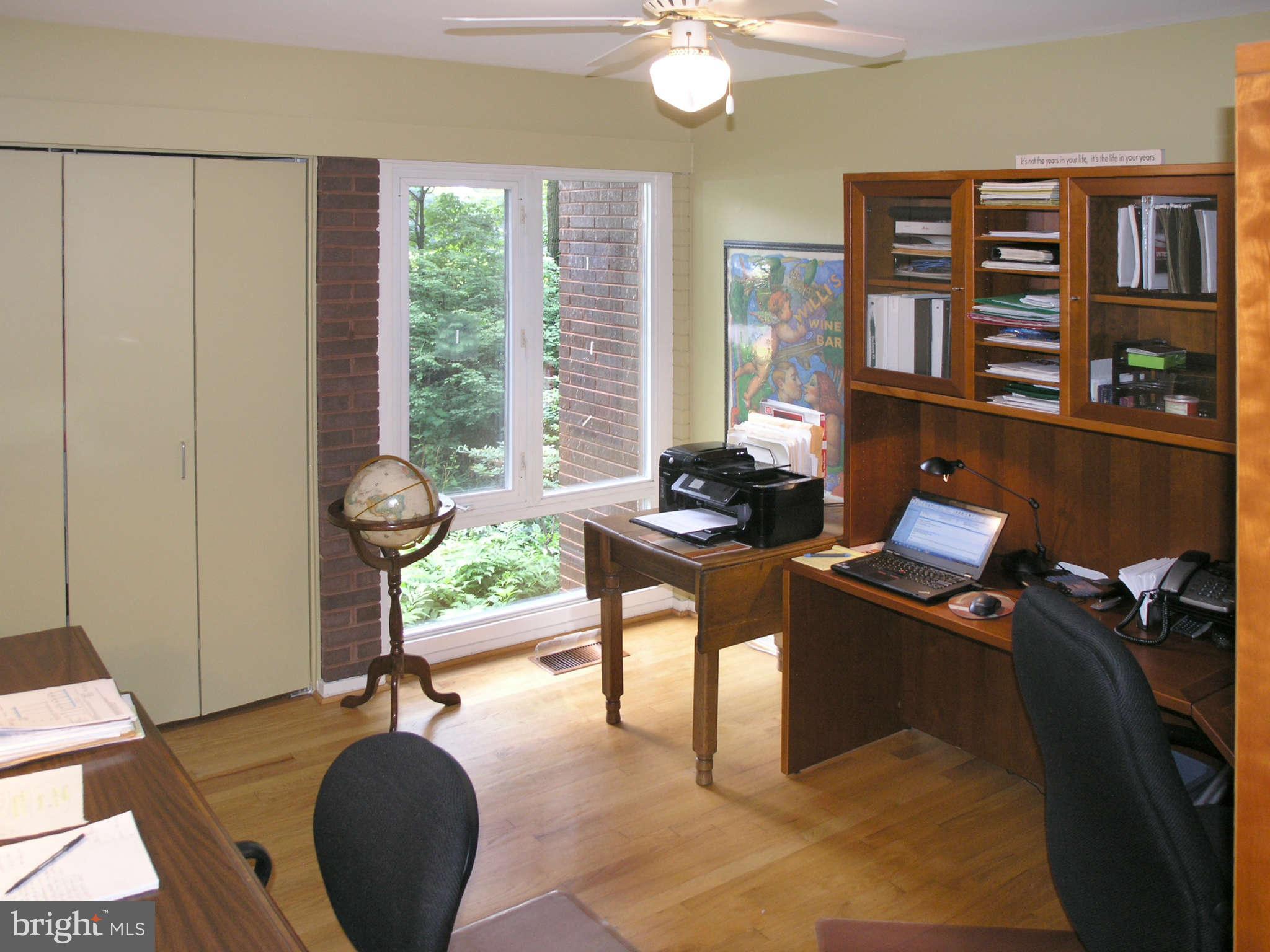 11431 Hook Road Reston, VA 20190 - Photo 21 of 30 a living room with furniture and a window