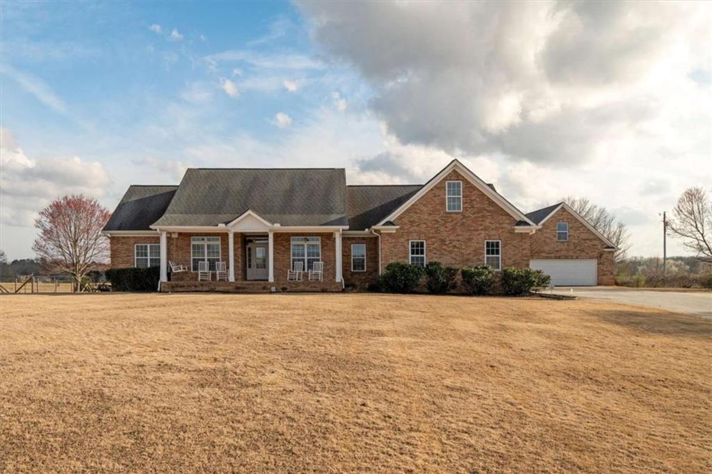 200 Spinks Road Temple, GA 30179 - Photo 1 of 1 a front view of a house with a yard