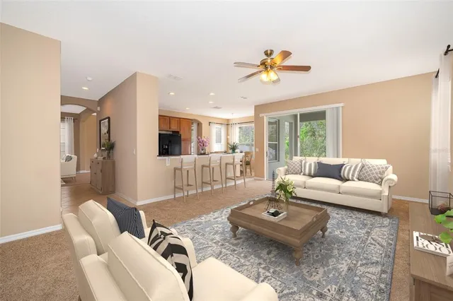 a living room with furniture and a table