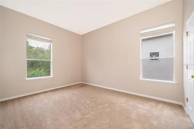 an empty room with windows