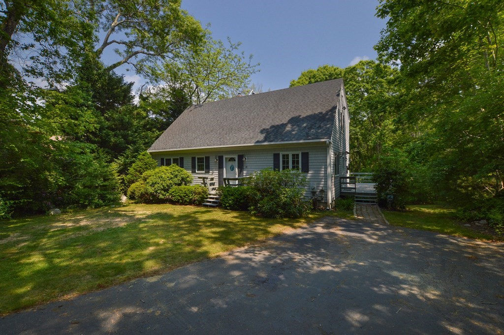 41 Braeside Road Falmouth, MA 02540 - Photo 1 of 24 a front view of a house with a yard