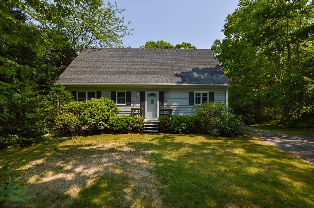 41 Braeside Road Falmouth, MA 02540 - Photo 22 of 24 a front view of house with yard and green space