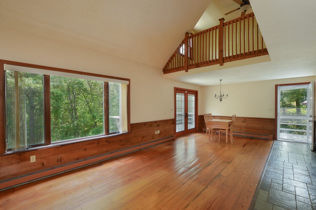 41 Braeside Road Falmouth, MA 02540 - Photo 5 of 24 a view of livingroom with furniture and staircase
