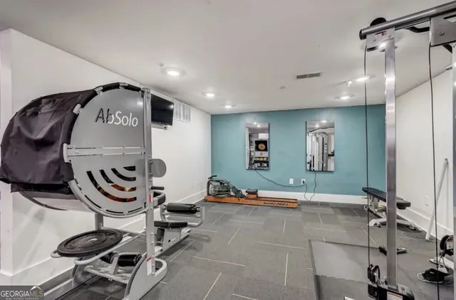 a view of a room with gym equipment