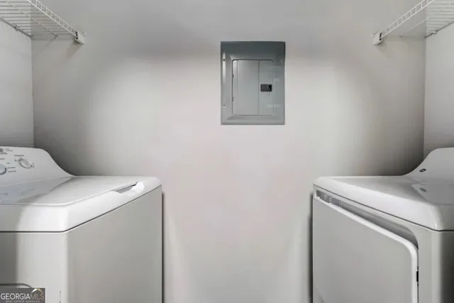 a utility room with dryer and washer