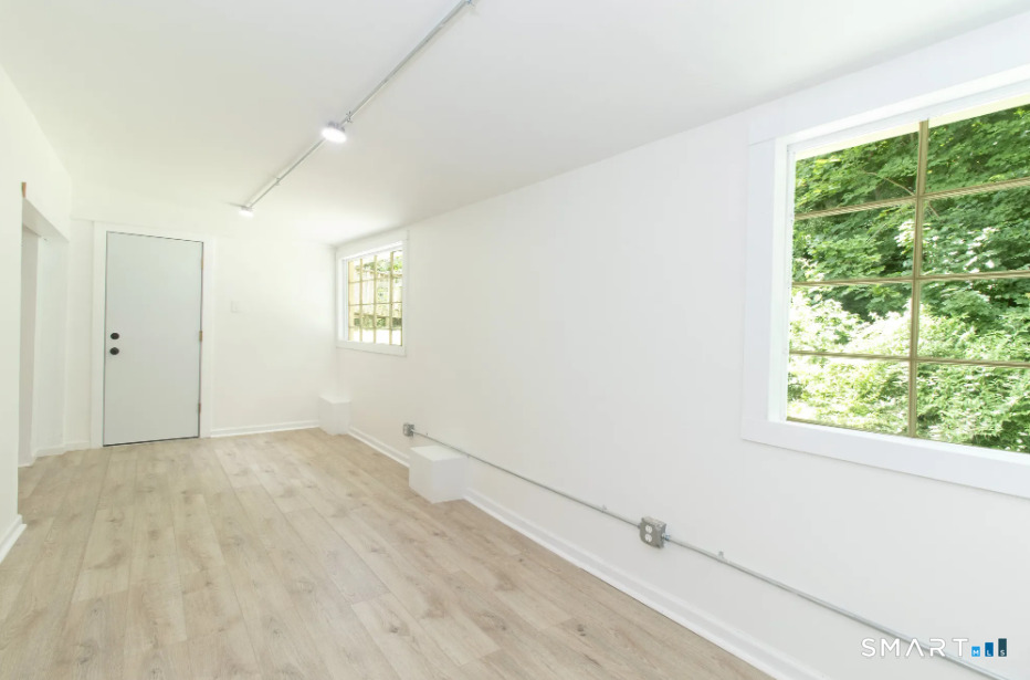 30 Grove Street, Unit B Branford, CT 06405 - Photo 3 of 7 an empty room with a window