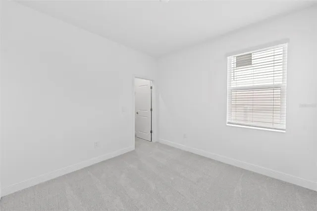 wooden floor and cabinet in an empty room