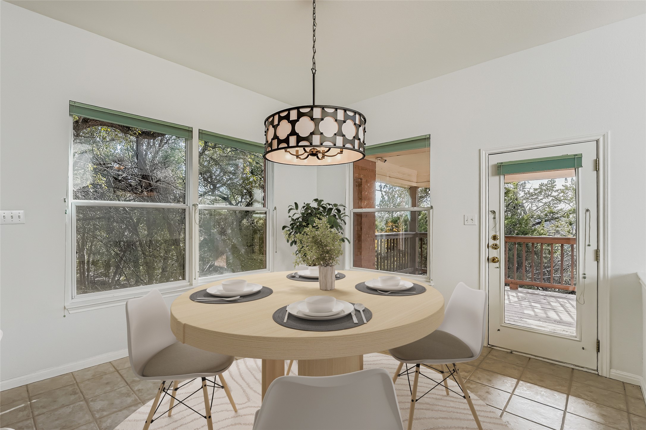 8204 Texas Plume Road Austin, TX 78759 - Photo 16 of 40 Dining area featuring baseboards and light tile patterned flooring