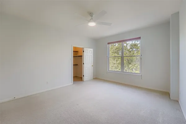 a view of balcony with wooden floor