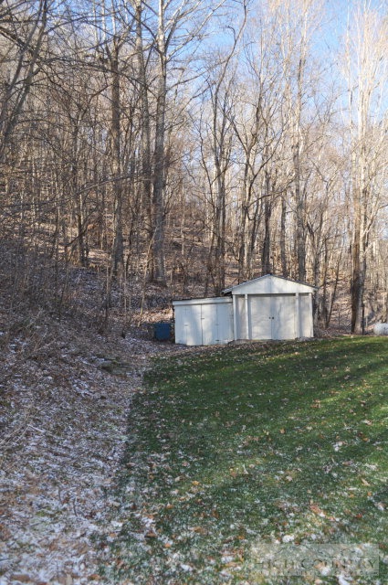 304 Green Knob Mountain Road Boone, NC 28607 - Photo 25 of 32 a view of a house with a yard
