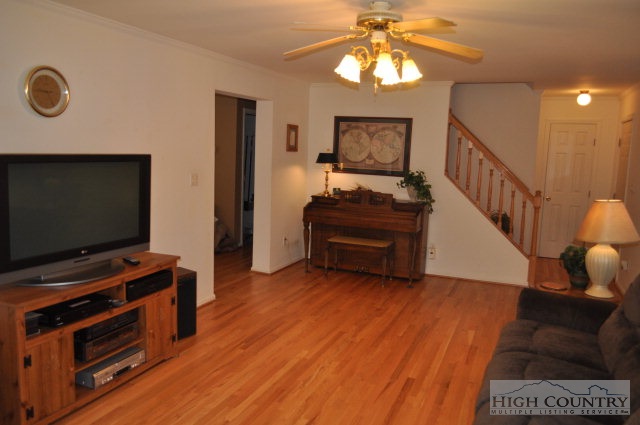 304 Green Knob Mountain Road Boone, NC 28607 - Photo 28 of 32 a room with furniture and wooden floor