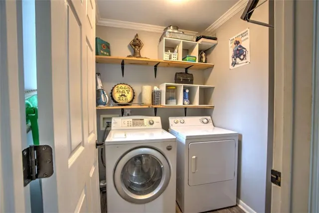 a utility room with dryer and washer