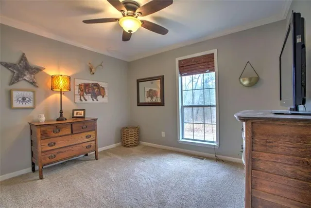 a view of room with window and cabinet