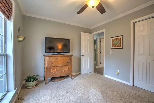a living room with flat screen tv