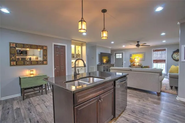 a kitchen with counter space and breakfast area