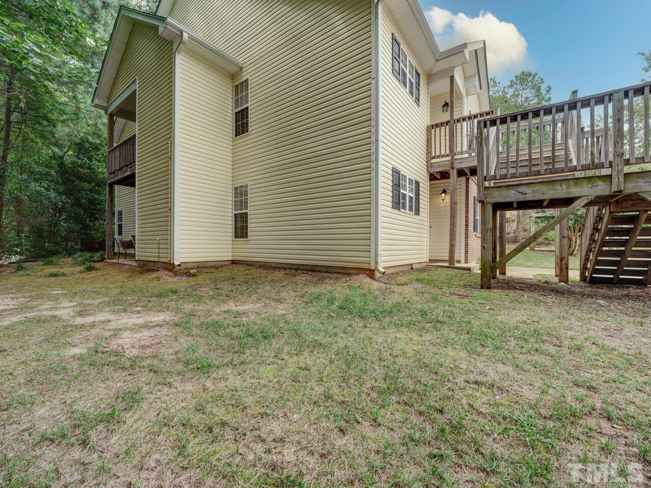 2221 Mountain Mist Court, Unit 101 Raleigh, NC 27603 - Photo 24 of 31 a view of front door and small yard