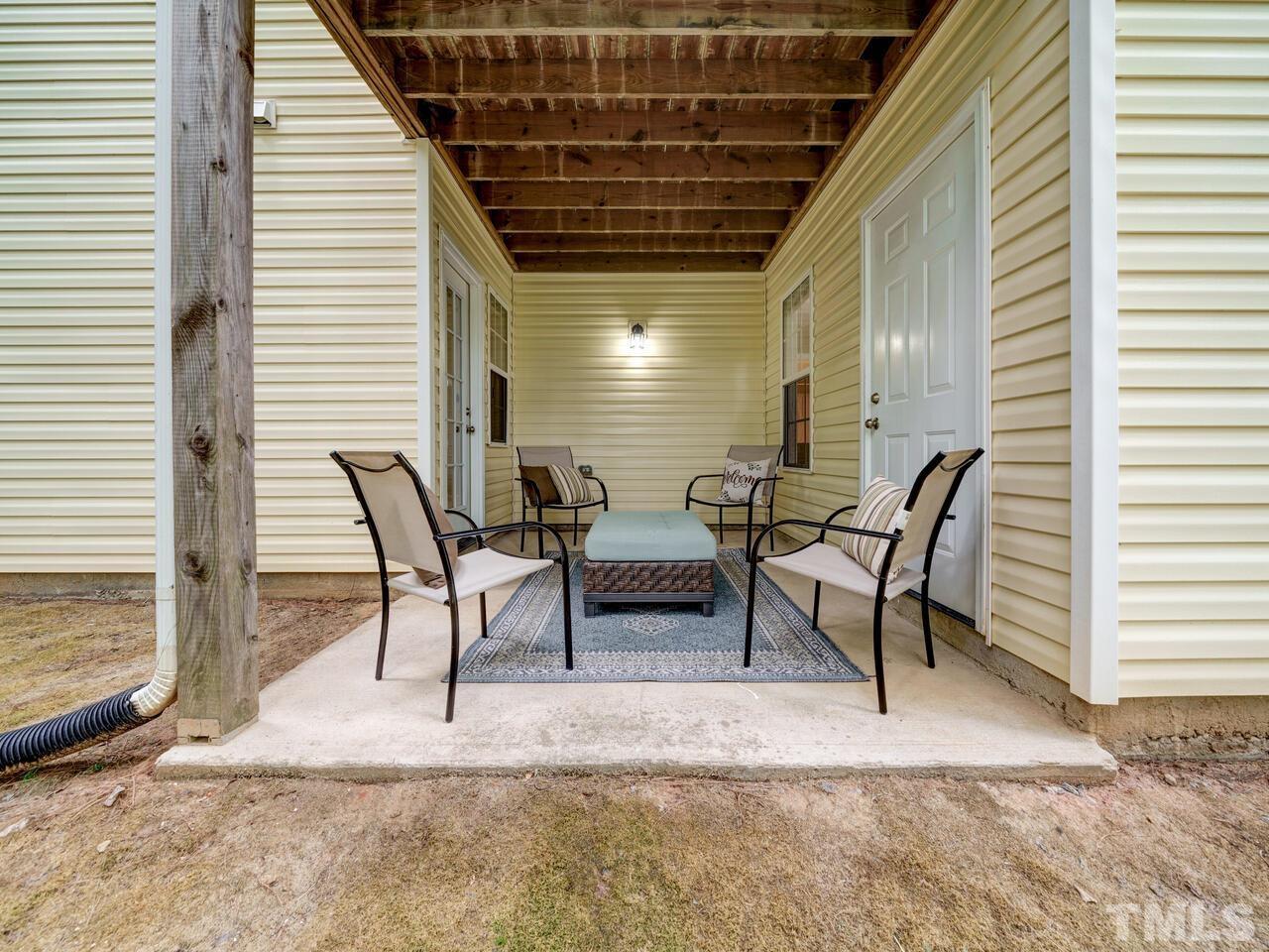 2221 Mountain Mist Court, Unit 101 Raleigh, NC 27603 - Photo 25 of 31 a view of dining room with furniture and a window