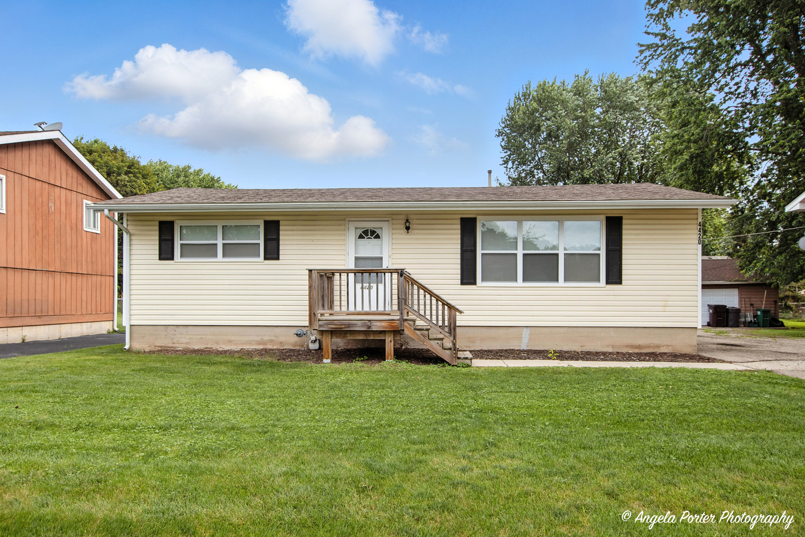 a house view with a garden space