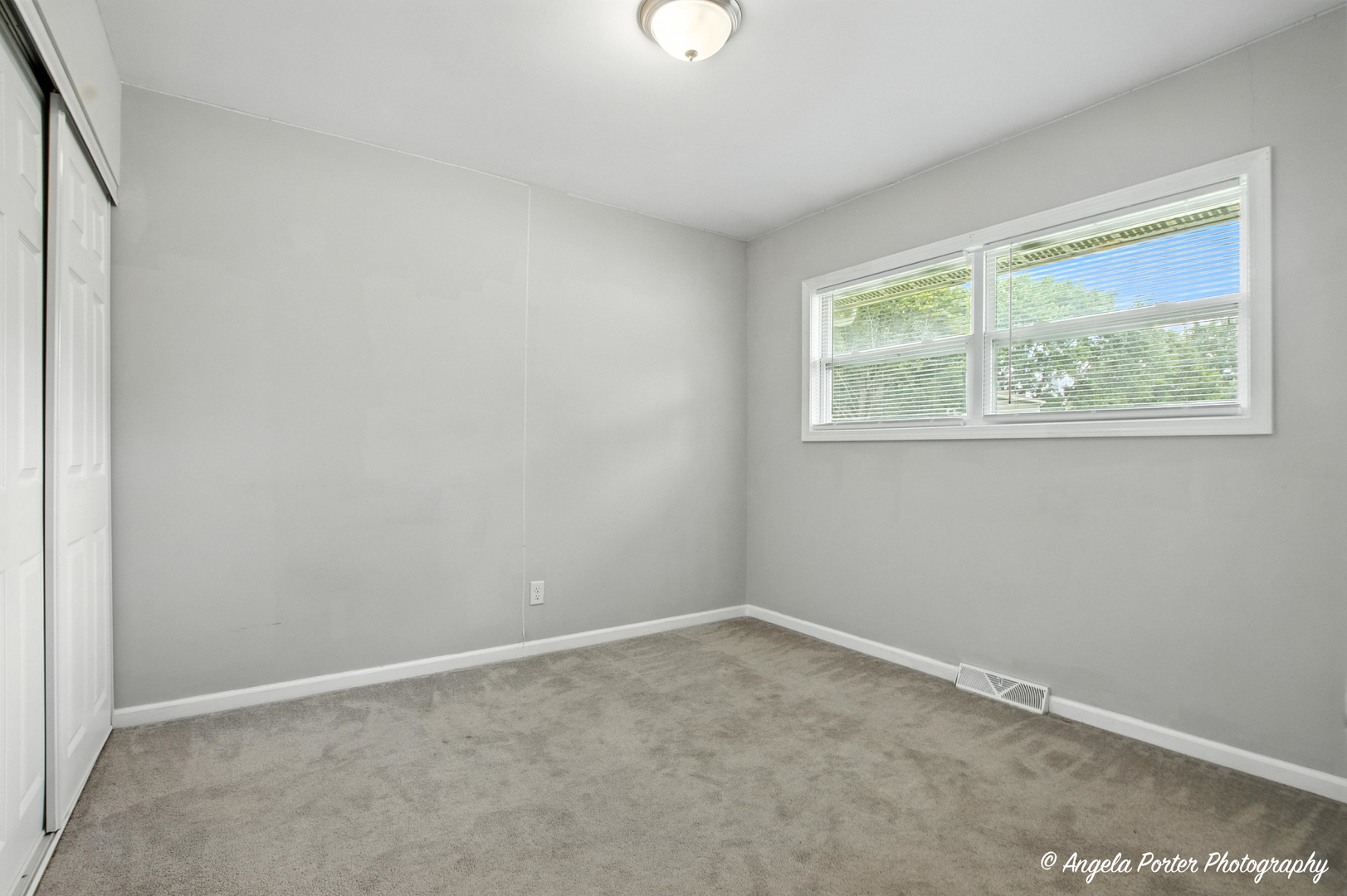 4420 Clearview Drive McHenry, IL 60050 - Photo 12 of 15 an empty room with a window