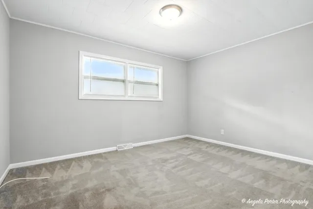 a bathroom with a sink a mirror and a shower