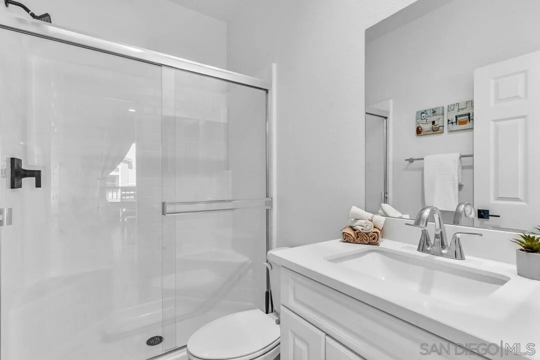 2811 Safflower Street Spring Valley, CA 91977 - Photo 12 of 28 a bathroom with a sink toilet and shower