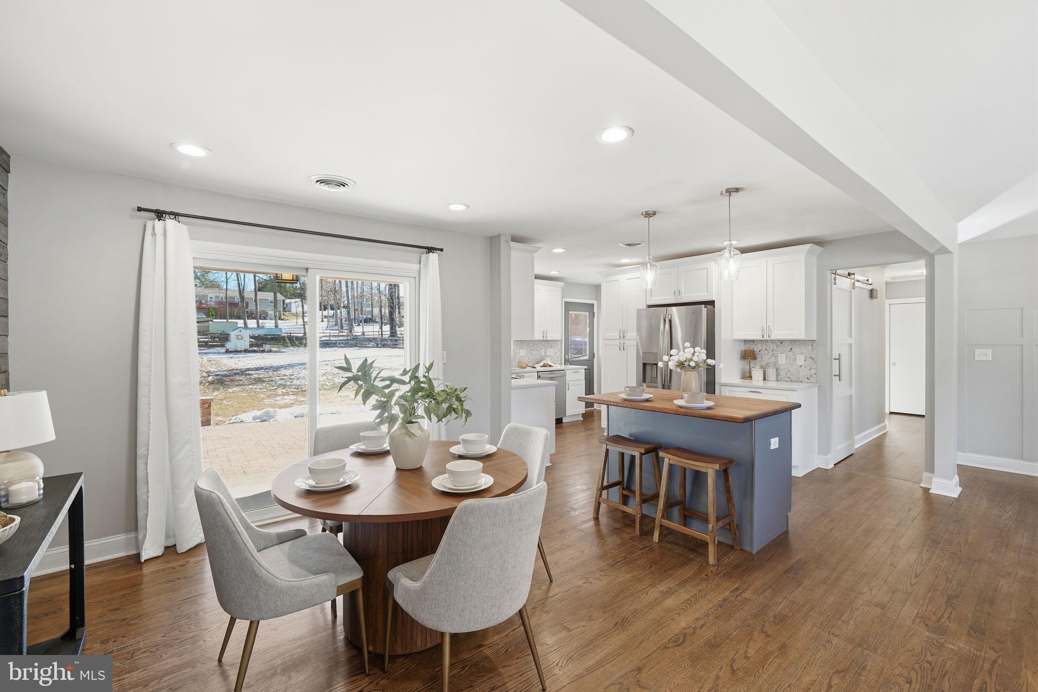 4231 Bartholows Road Mount Airy, MD 21771 - Photo 13 of 53 a view of a dining room with furniture window and wooden floor