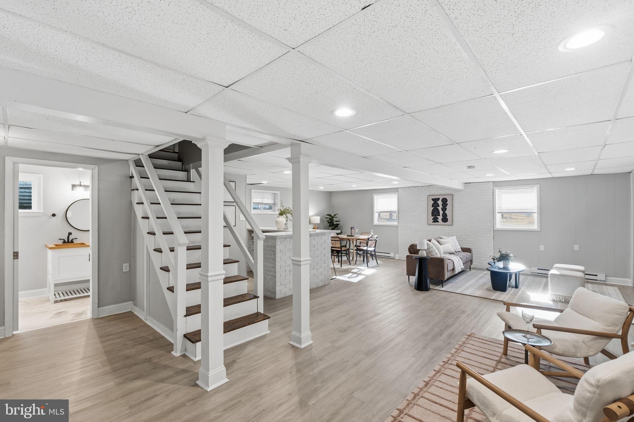 4231 Bartholows Road Mount Airy, MD 21771 - Photo 33 of 53 a living room with furniture and wooden floor
