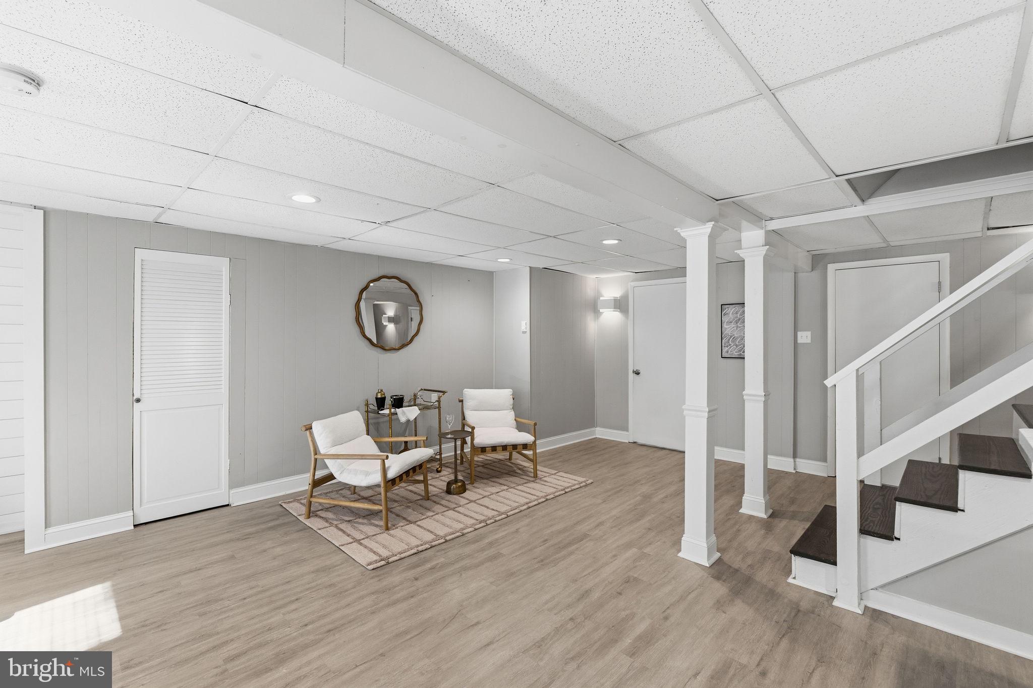 4231 Bartholows Road Mount Airy, MD 21771 - Photo 35 of 53 a living room with wooden floor and furniture