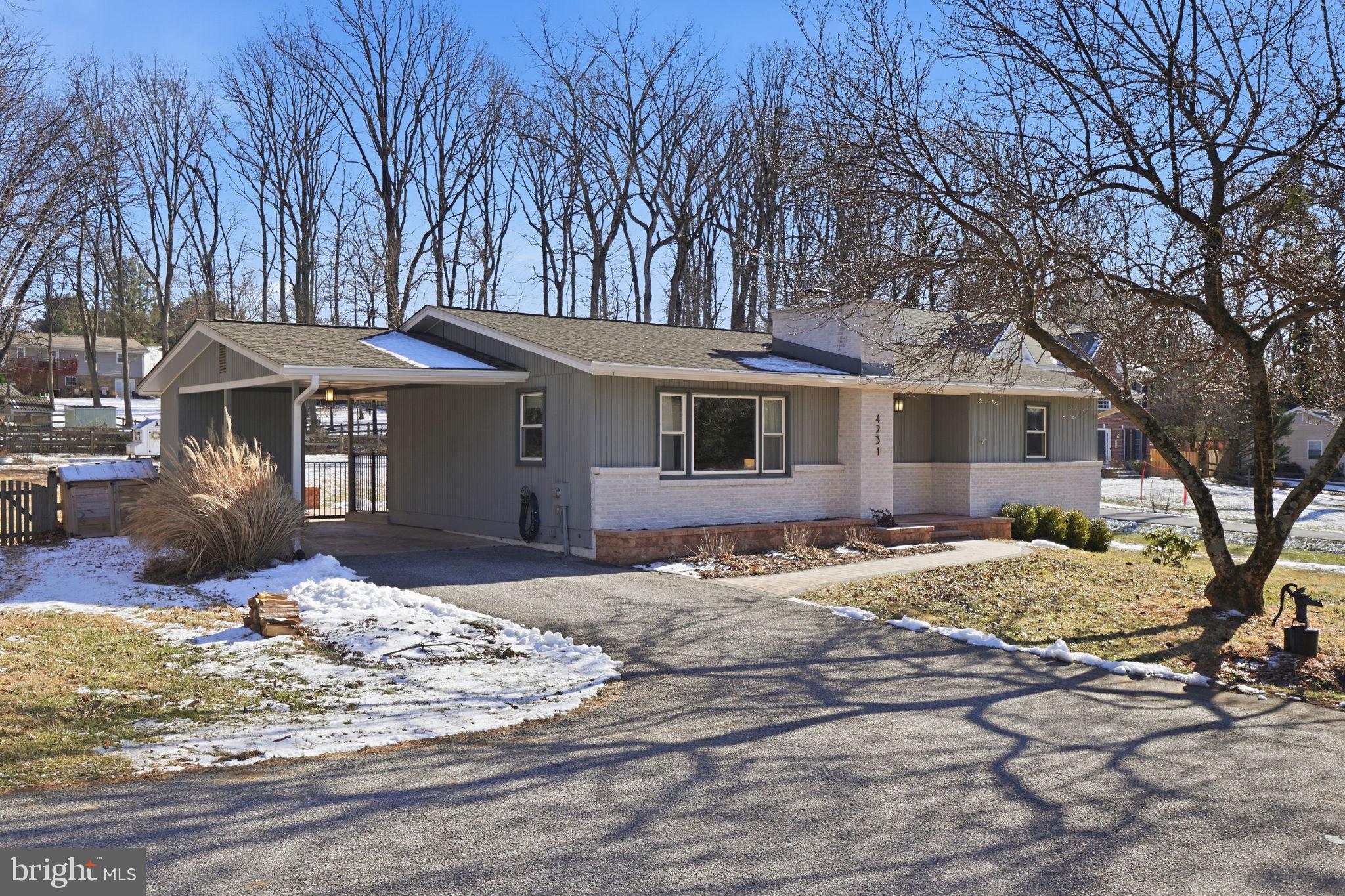 4231 Bartholows Road Mount Airy, MD 21771 - Photo 45 of 53 a front view of a house with a yard