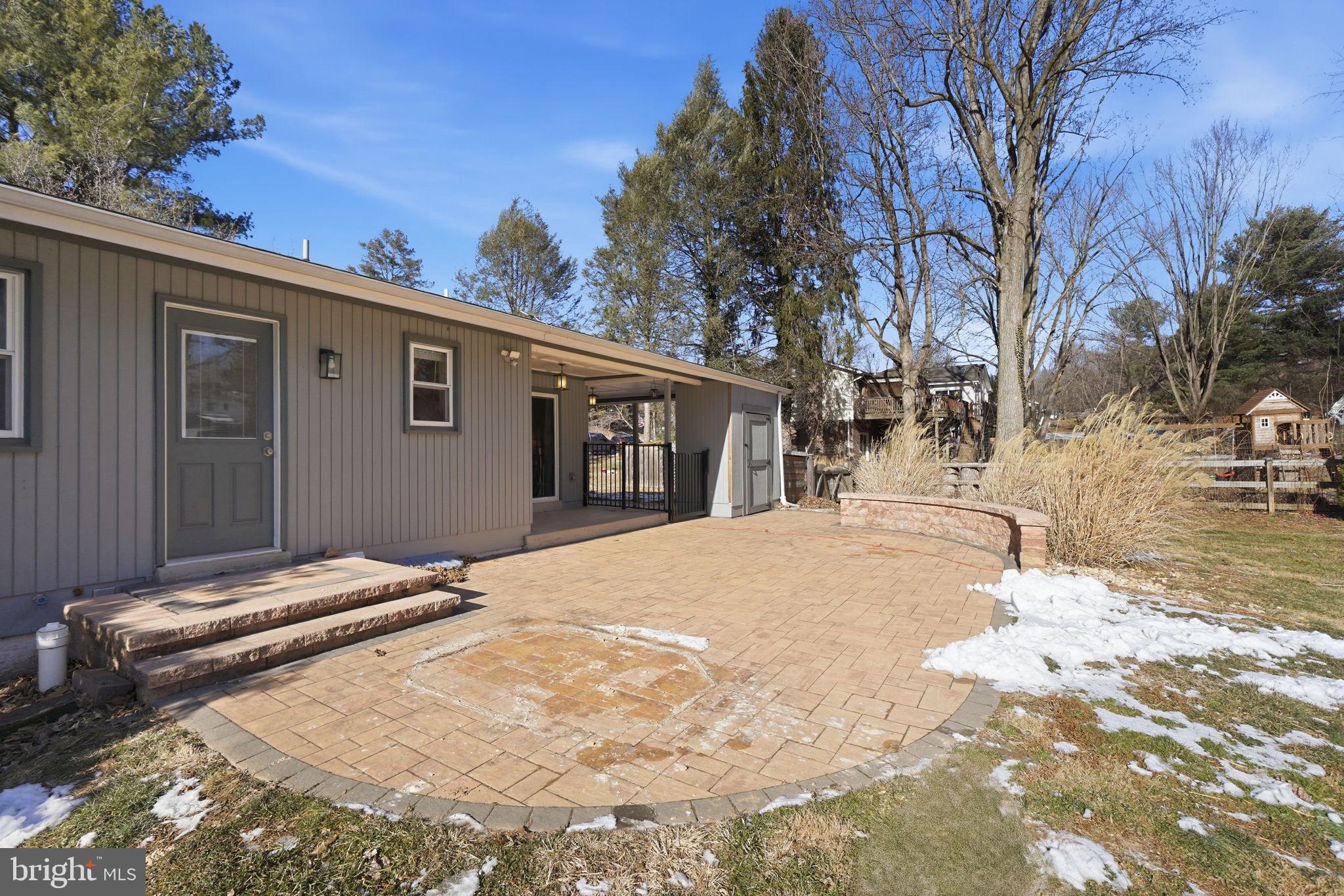 4231 Bartholows Road Mount Airy, MD 21771 - Photo 49 of 53 a backyard of a house with large trees and outdoor space