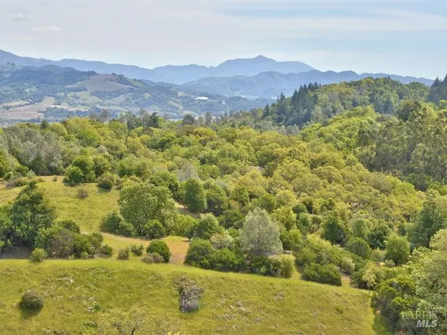 a view of a mountain with an outdoor space