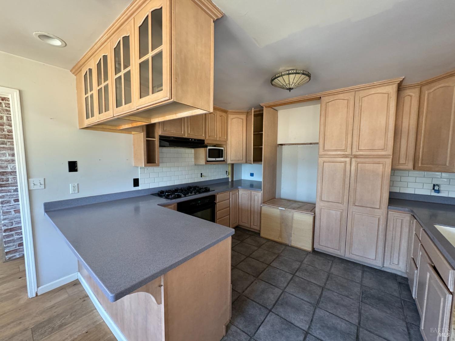950 Canyon Road Geyserville, CA 95441 - Photo 8 of 23 a kitchen with stainless steel appliances granite countertop a sink a stove and a refrigerator
