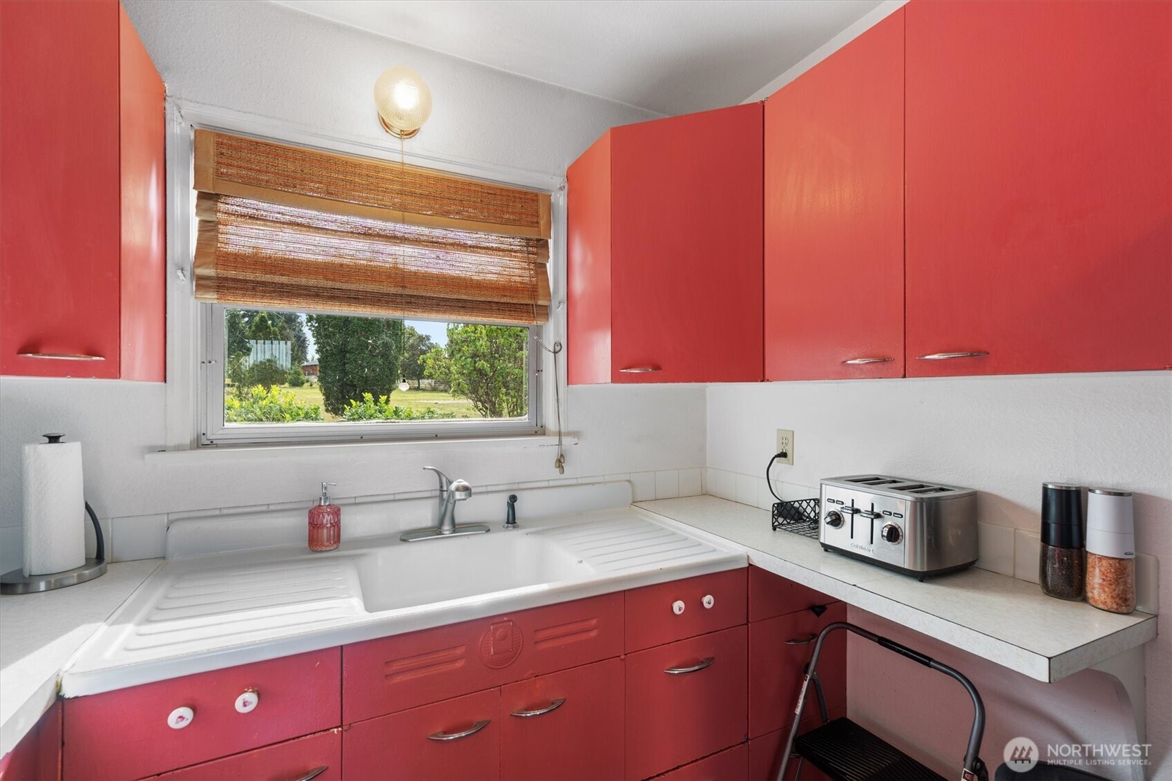 475 South 2nd Street Cathlamet, WA 98612 - Photo 13 of 40 a kitchen with a sink cabinets and window