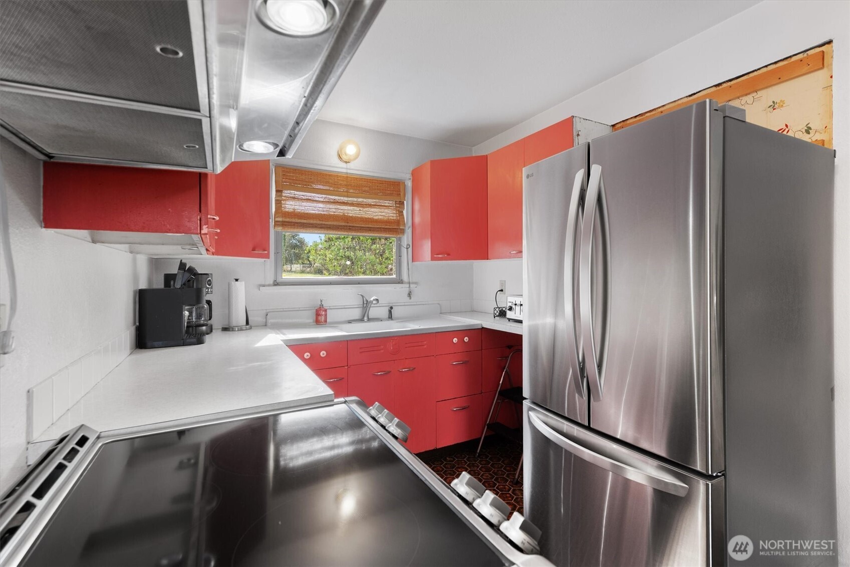 475 South 2nd Street Cathlamet, WA 98612 - Photo 15 of 40 a kitchen with stainless steel appliances granite countertop a refrigerator and a sink