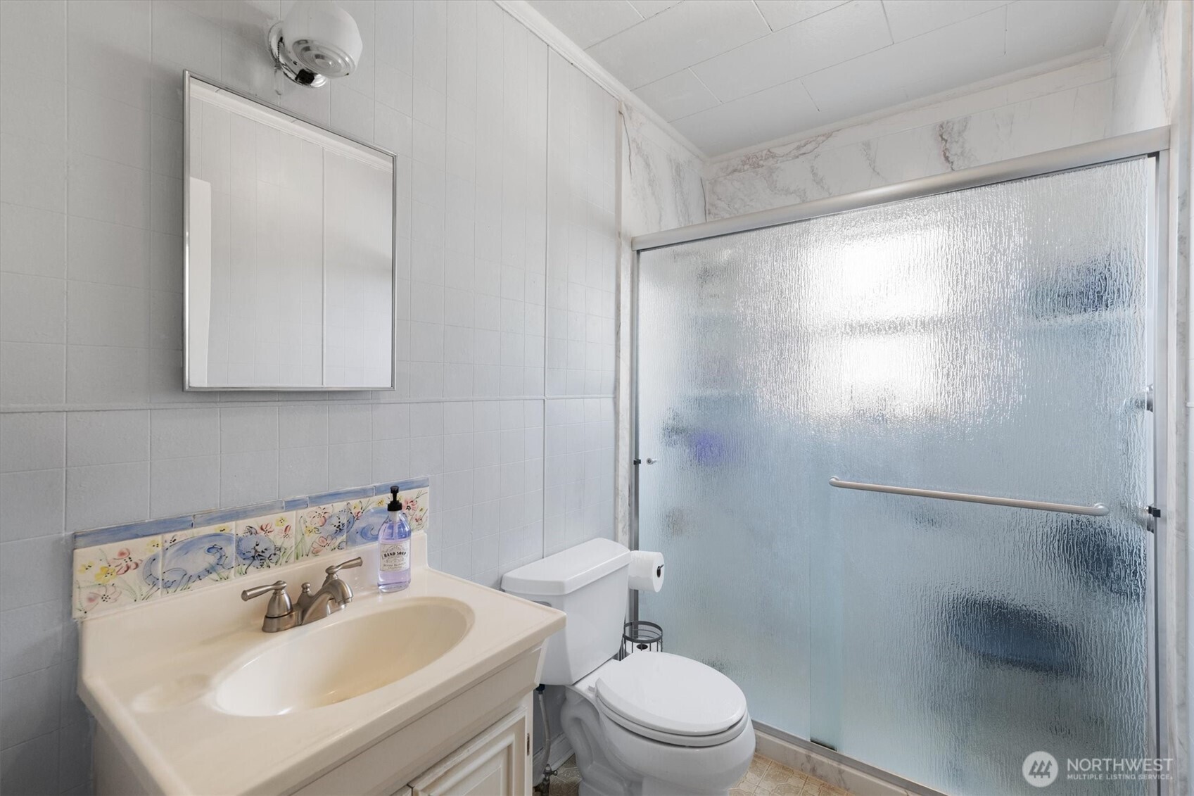 475 South 2nd Street Cathlamet, WA 98612 - Photo 19 of 40 a bathroom with a sink toilet and shower