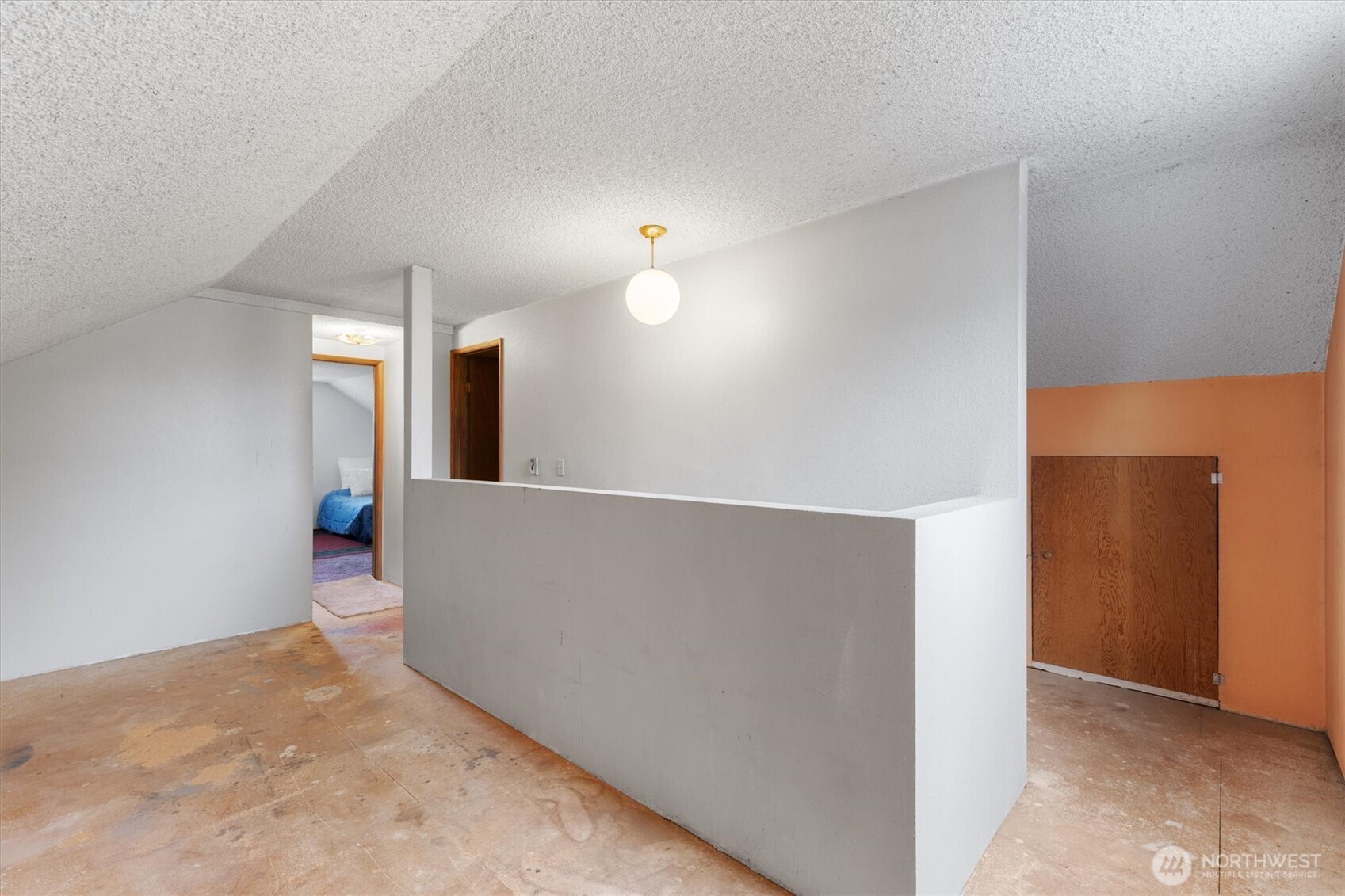 475 South 2nd Street Cathlamet, WA 98612 - Photo 24 of 40 an empty room with wooden floor and windows
