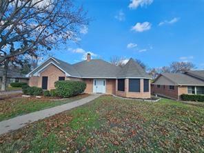 6530 Talbot Parkway Dallas, TX 75232 - Photo 2 of 18 front view of a house with a yard