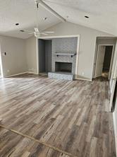 6530 Talbot Parkway Dallas, TX 75232 - Photo 5 of 18 a view of empty room with a fireplace