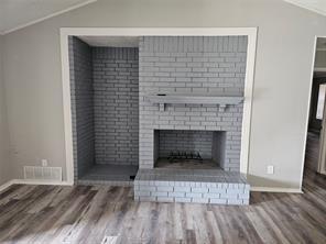 6530 Talbot Parkway Dallas, TX 75232 - Photo 6 of 18 a living room with a fireplace