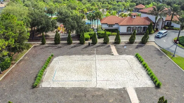 a view of a swimming pool with a yard